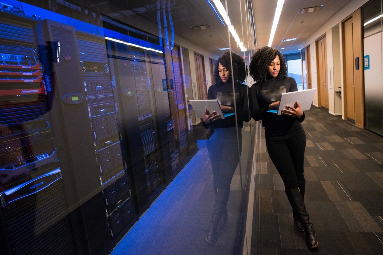 Woman-holding-laptop